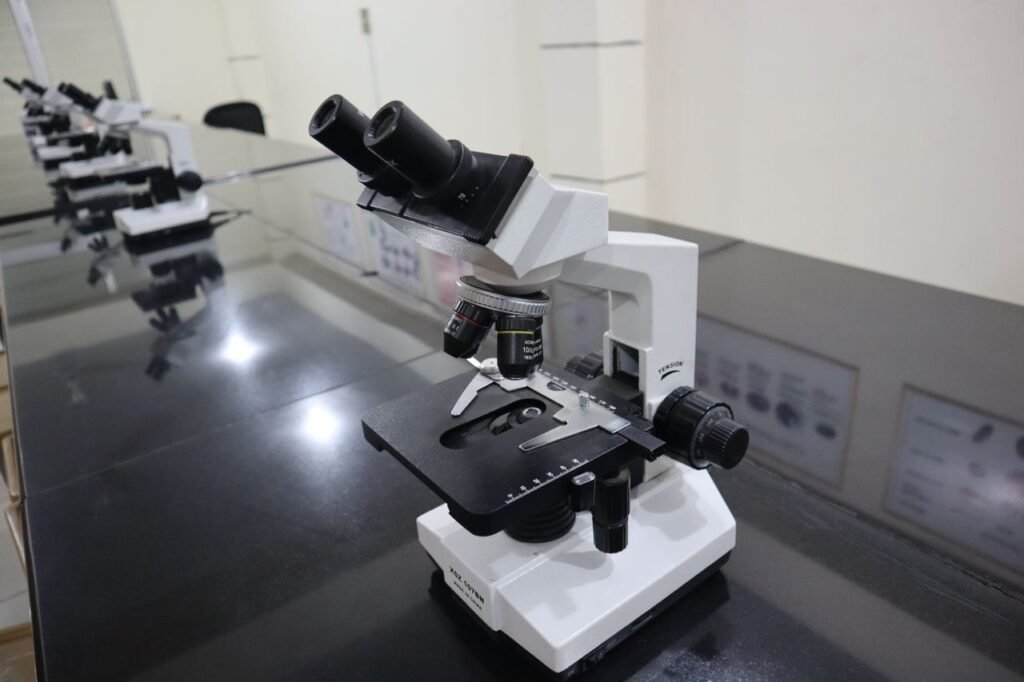 High-quality image of a microscope in a laboratory setting, perfect for science and research themes.